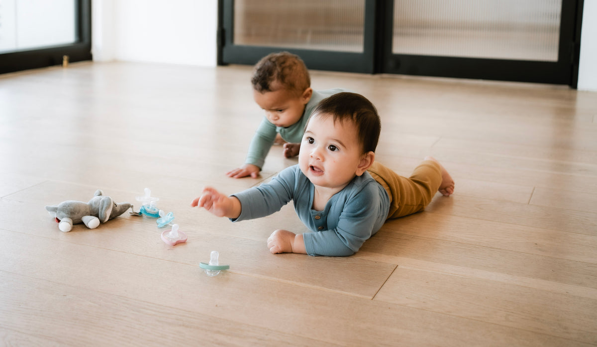 Baby with pacifier, Tiny Trials