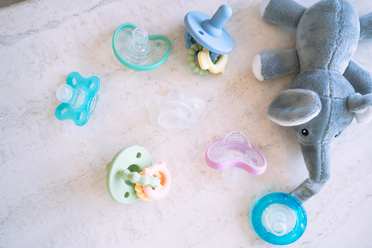 Baby with pacifiers, Tiny Trials